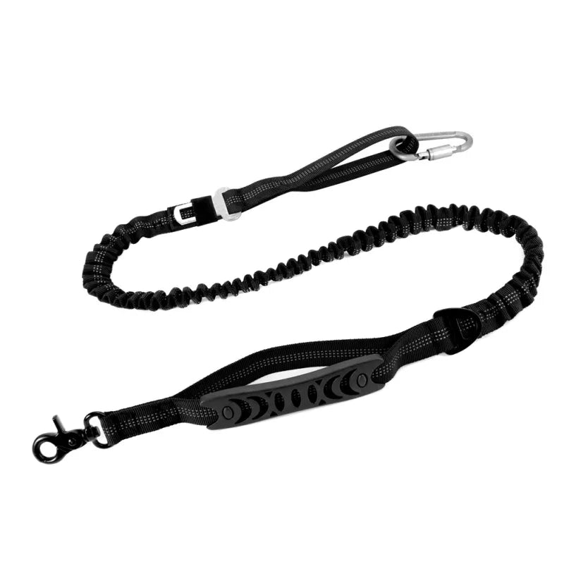 Black bungee dog lead laid out with a silver carabiner clipped to the handle end