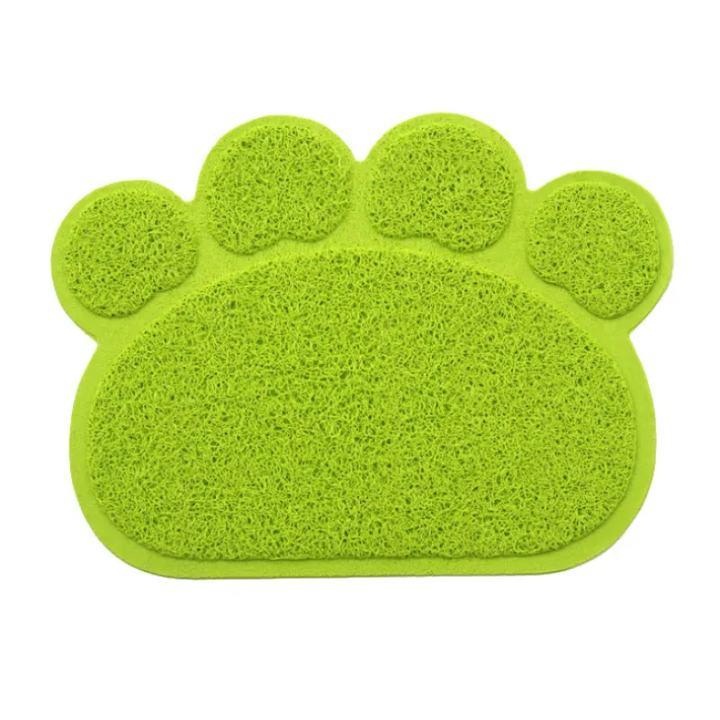 Lime green paw-shaped cat litter mat with a looped surface