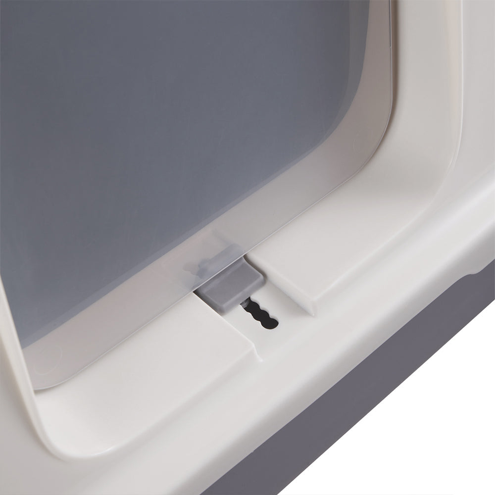 Close view of the slide at the foot of the translucent front flap door