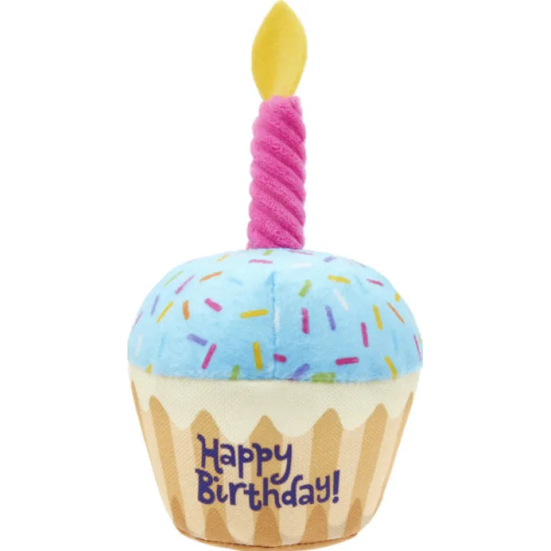 Plush cupcake dog toy with a blue sprinkled top and one pink candle