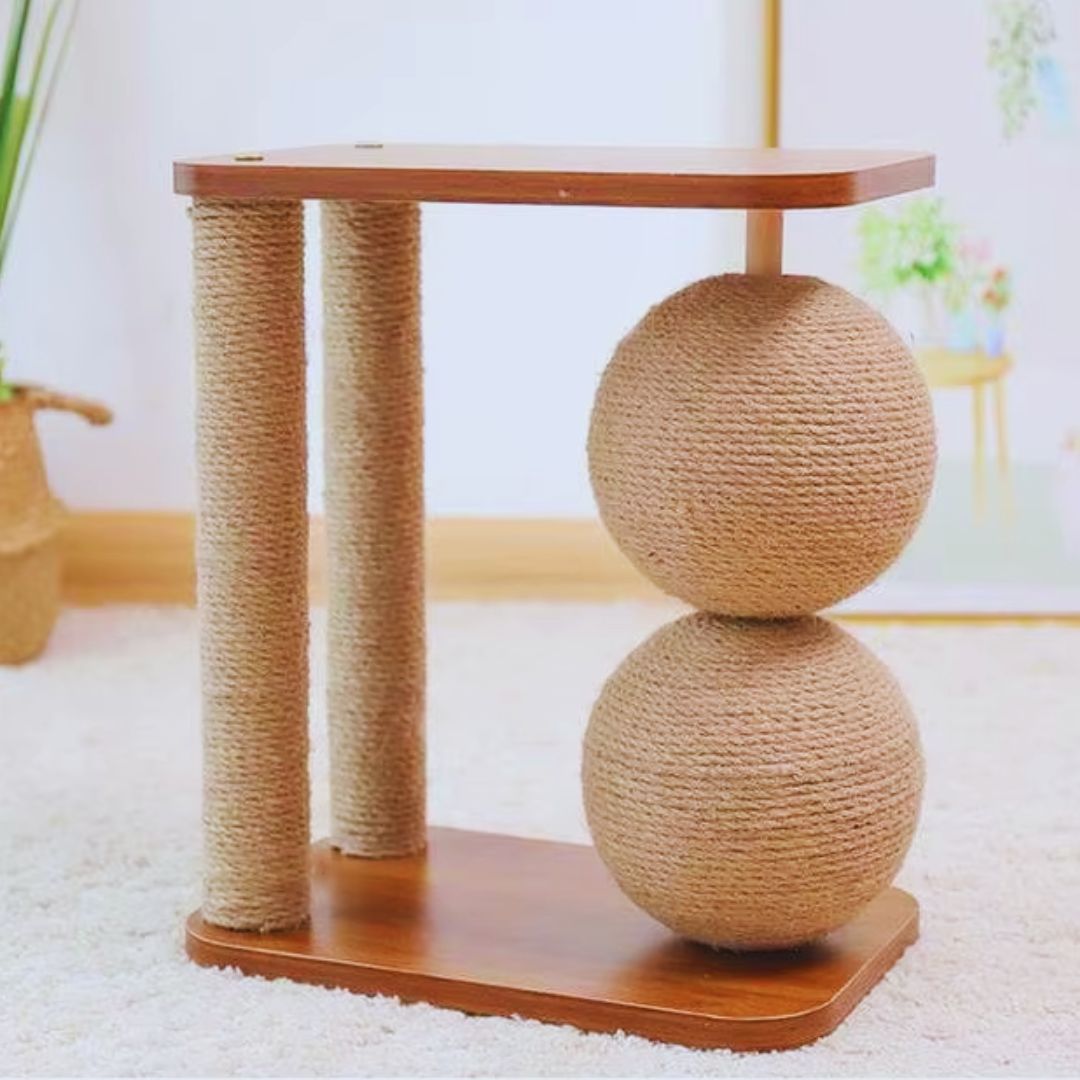 Sisal ball cat scratching post with two sisal posts and a walnut-brown top perch on a white rug