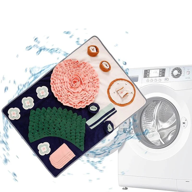 Pink Rose snuffle mat beside a front-loading washing machine