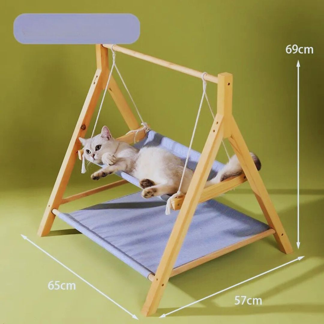 A cat in the light blue swing hammock, with the bed's size: 65 cm long, 57 cm deep, 69 cm high