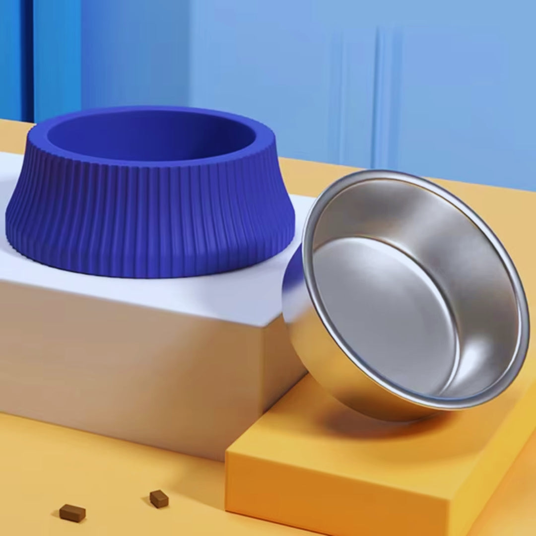 The blue round ribbed shell with its stainless steel insert lifted out beside it