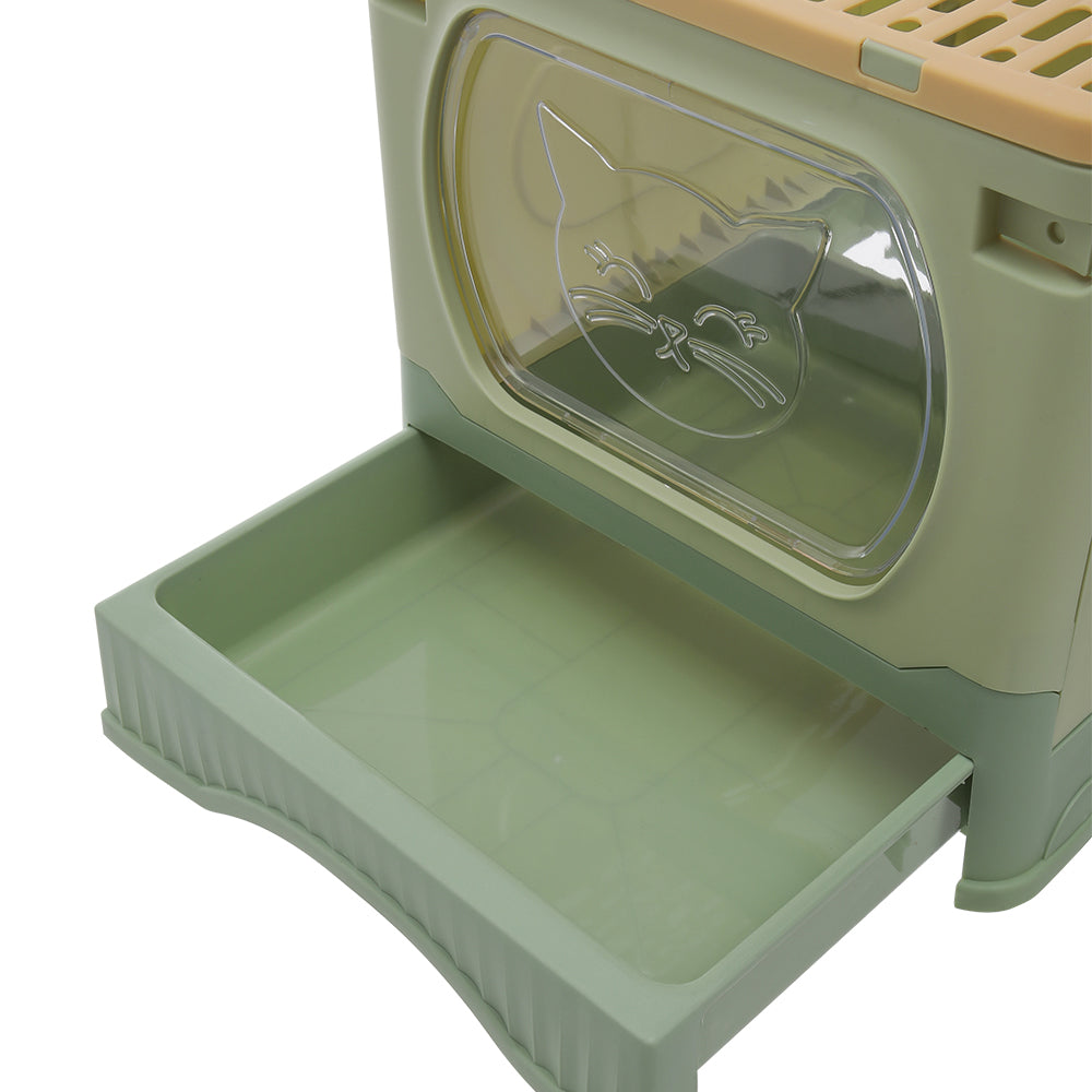 Close-up of the open drawer below the clear front door