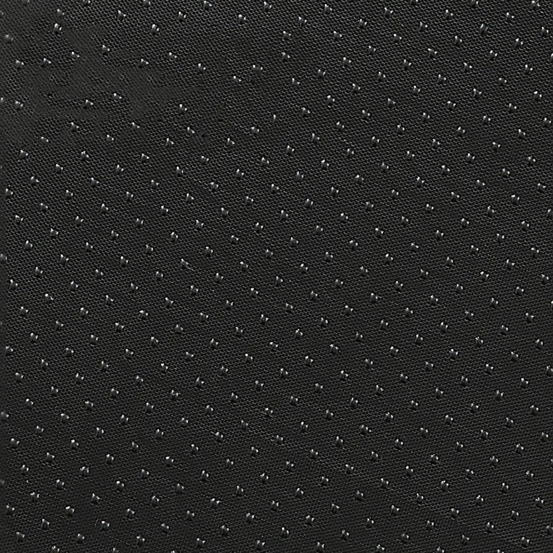 Close-up of the black underside of the cat bed with small raised dots