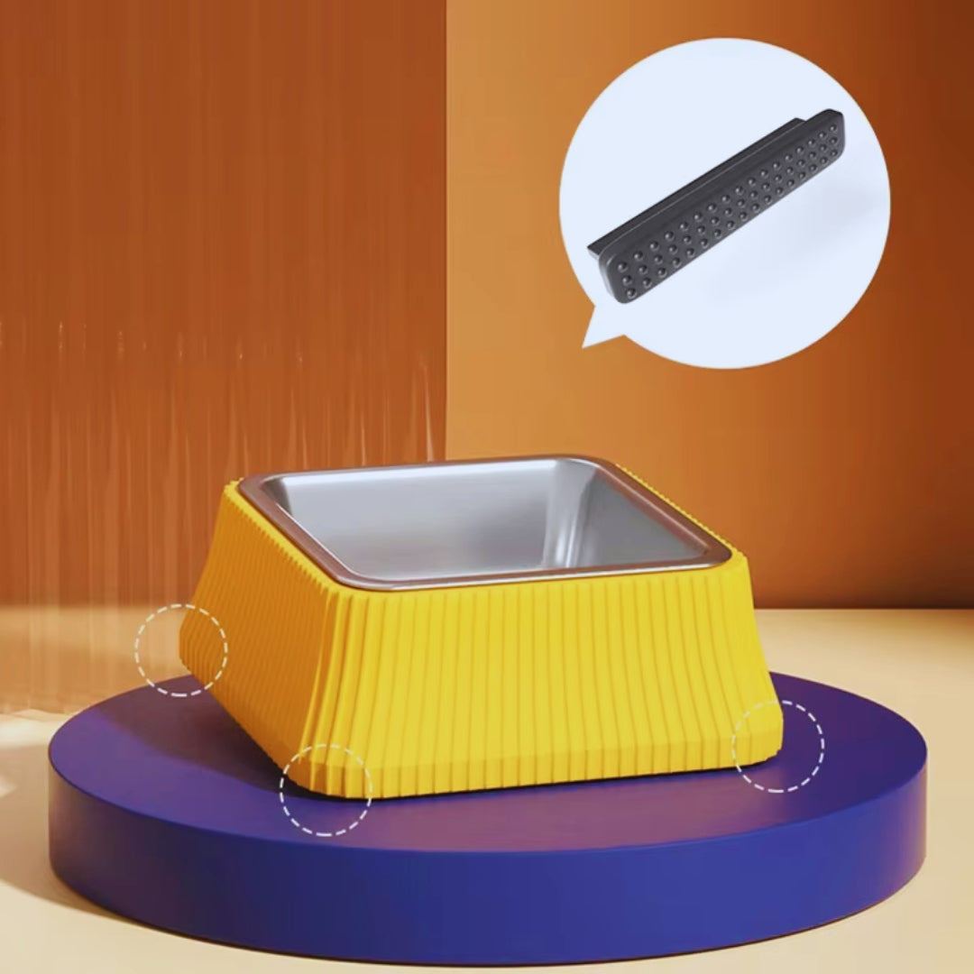 Yellow square ribbed dog bowl with a steel insert and a close view of the non-slip strip under its base