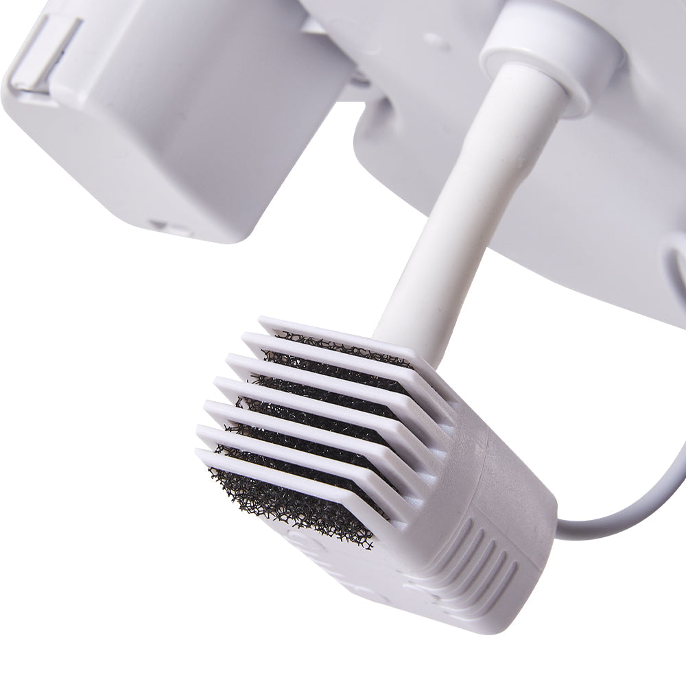 The pump with its comb-shaped filter holder and dark filter sponge