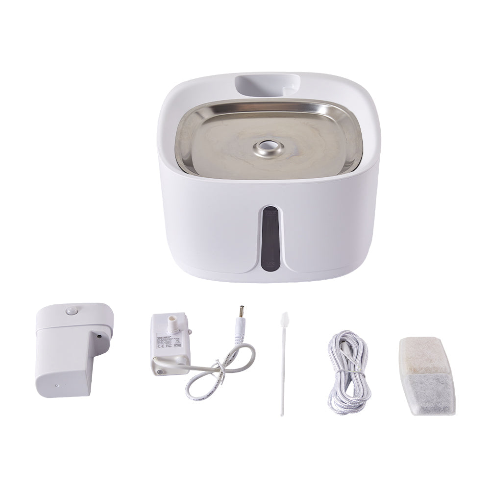 The water fountain with its pump, control module, power adapter, cable, brush and filter