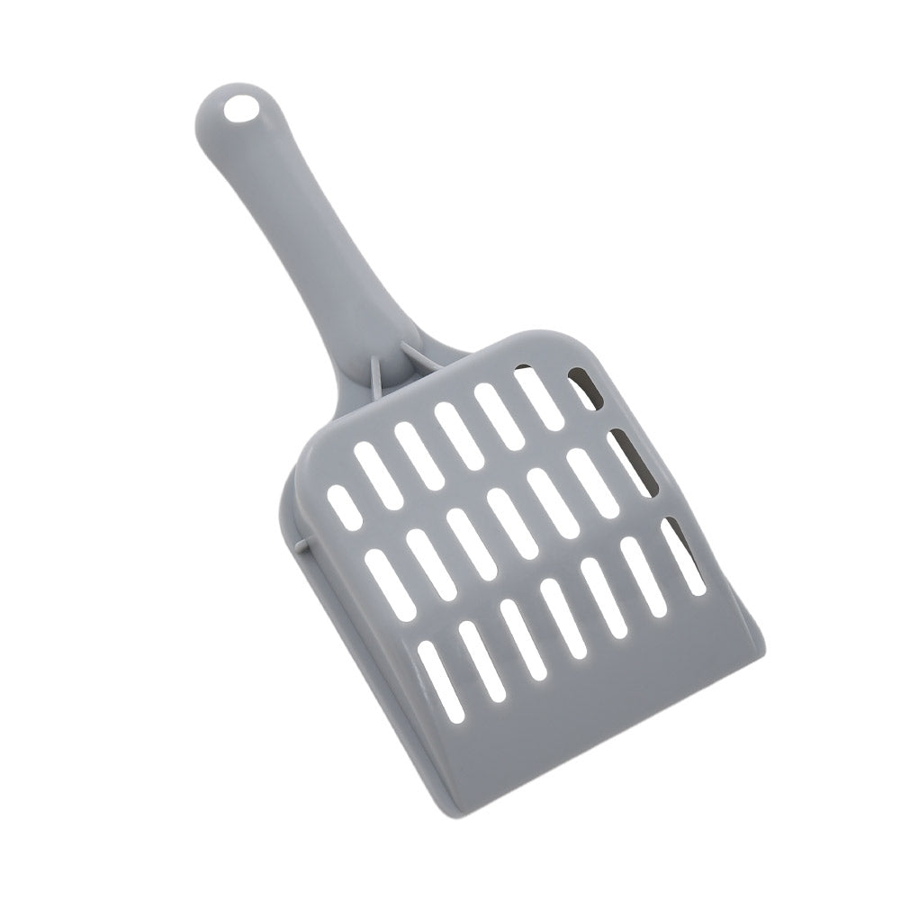 The grey slotted litter scoop included with the box