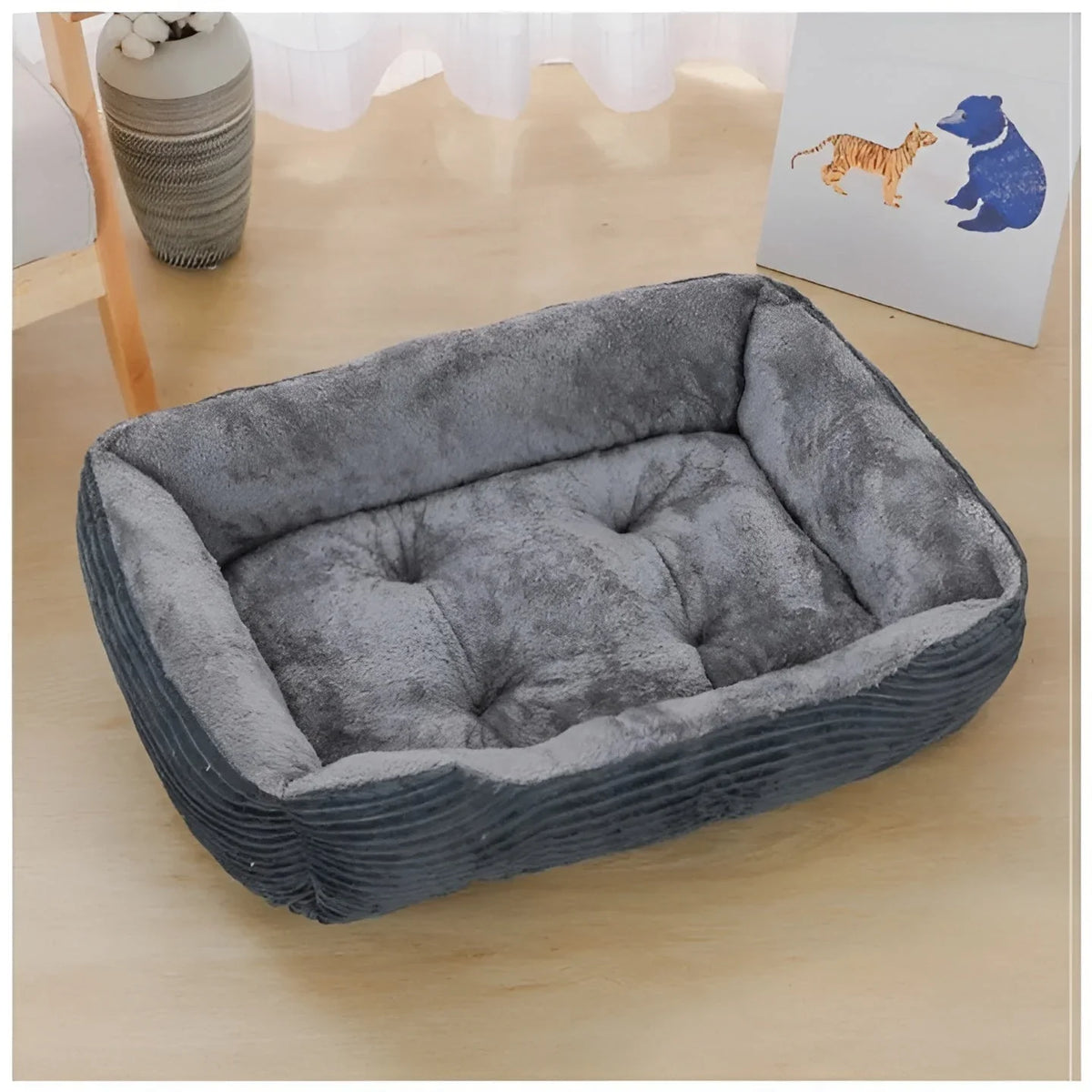 Dark grey rectangular dog bed with ribbed outer sides and a tufted grey plush seat