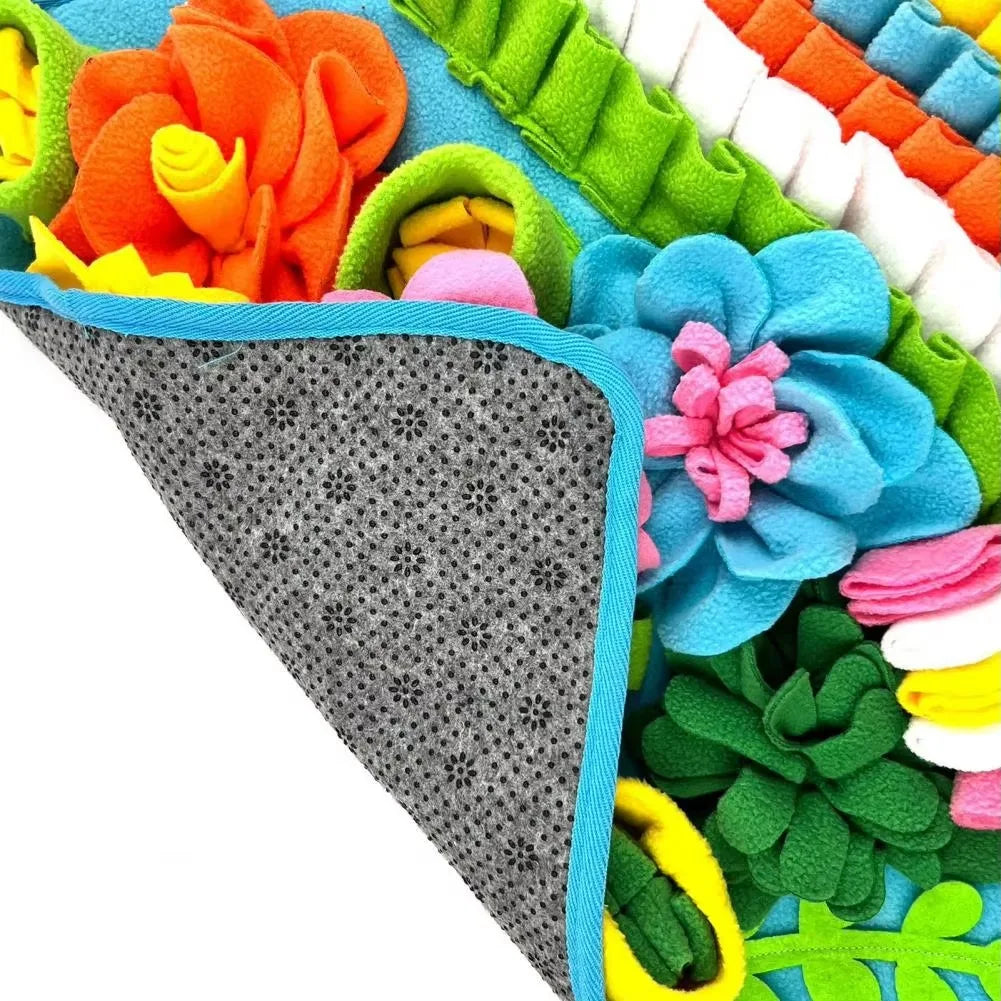 The corner of the mat turned over to show the grey dotted backing