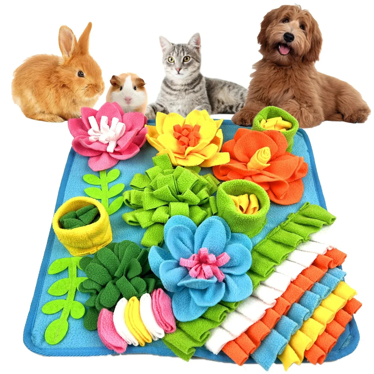 Blue snuffle mat covered in colourful fabric flowers, leaves and strips, with a rabbit, guinea pig, cat and dog behind it
