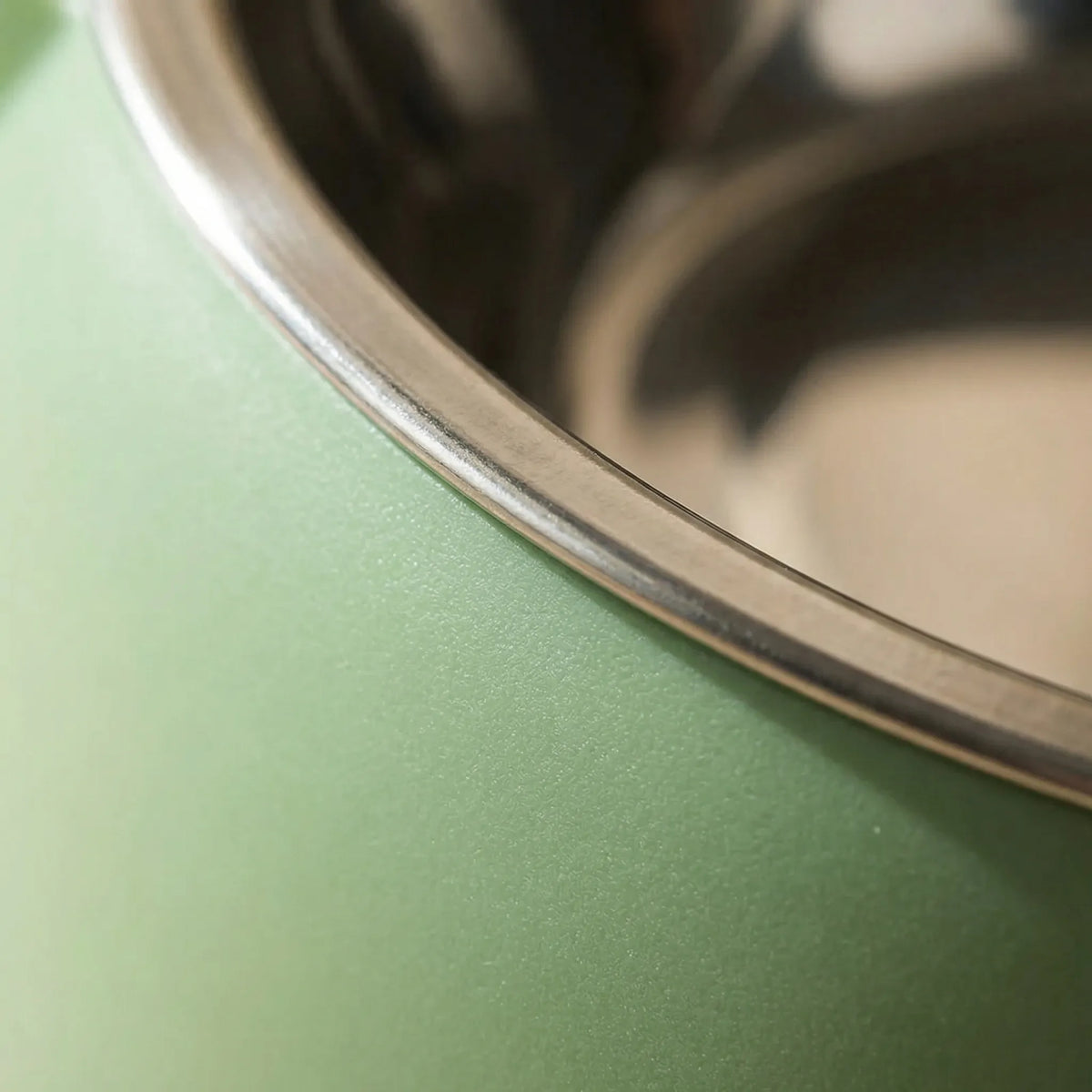 Close-up of the steel rim resting in the green base