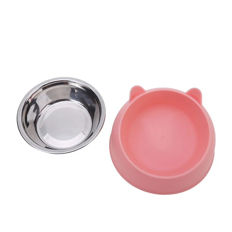 The stainless steel bowl lifted out of the pink base
