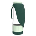 Green dog water bottle with a leaf-shaped trough, a clear body and a mint food container at the base