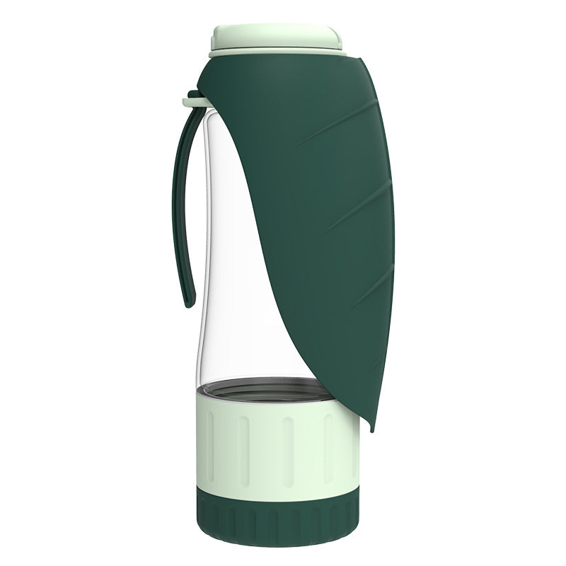 Green dog water bottle with a leaf-shaped trough, a clear body and a mint food container at the base