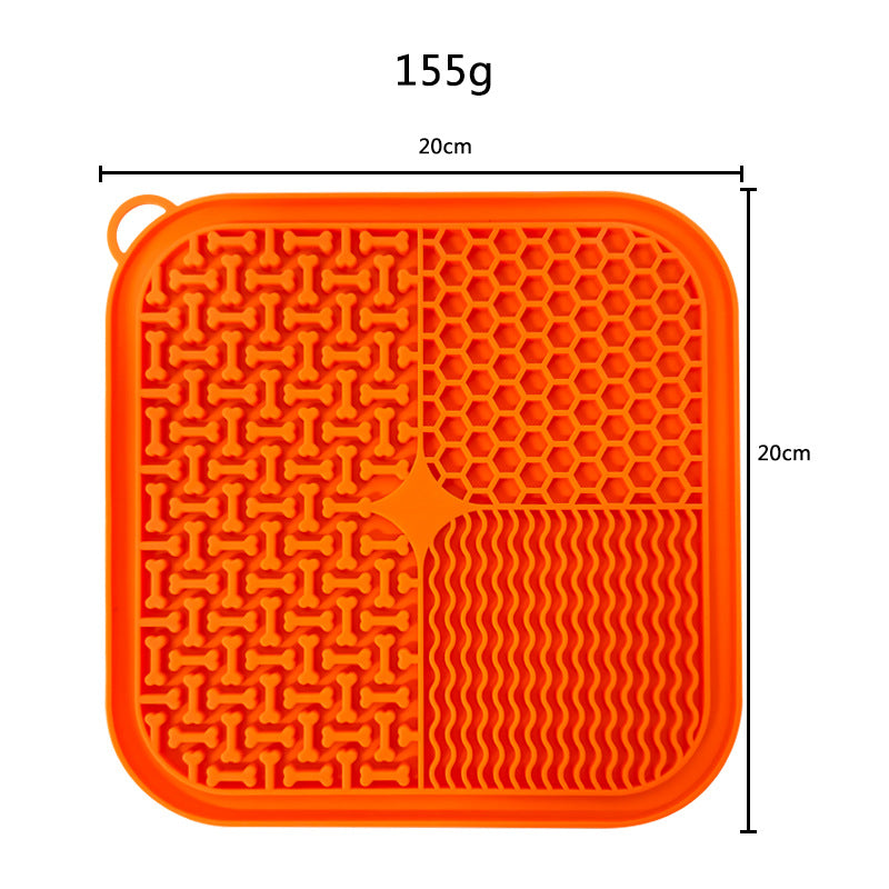 Orange lick mat with its size, 20 by 20 cm, and weight, 155 g, marked