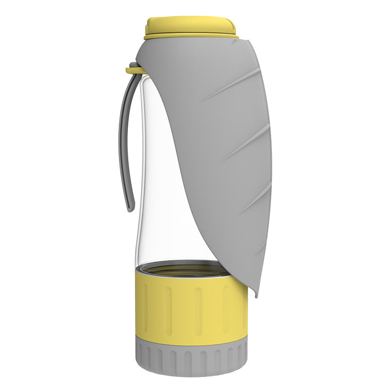 Dog water bottle with a grey leaf-shaped trough and a yellow food container