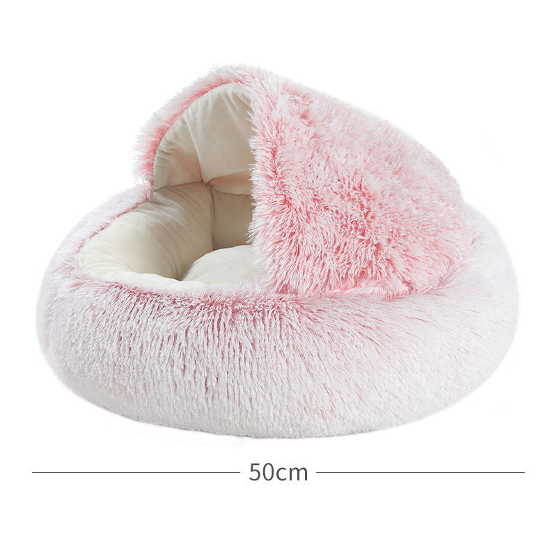 Pink plush hooded cave bed with a line marking its 50 cm diameter