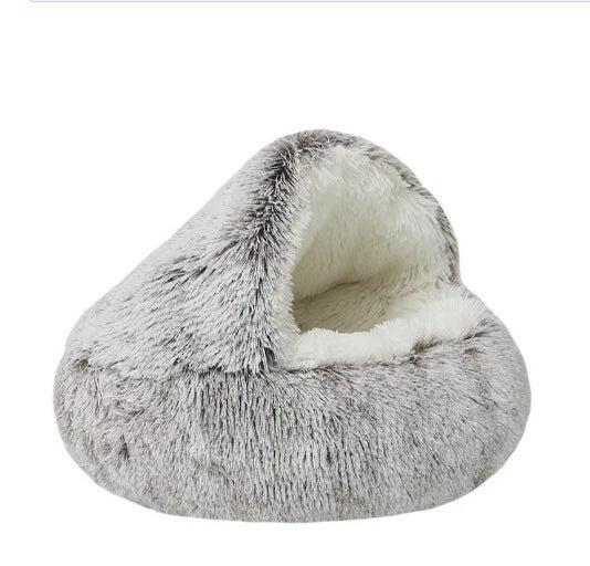 Grey frosted plush hooded cave bed seen from the side on a white background