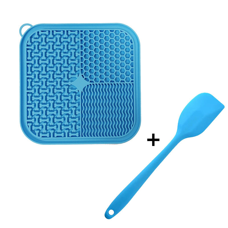 Blue silicone lick mat with a matching blue spatula