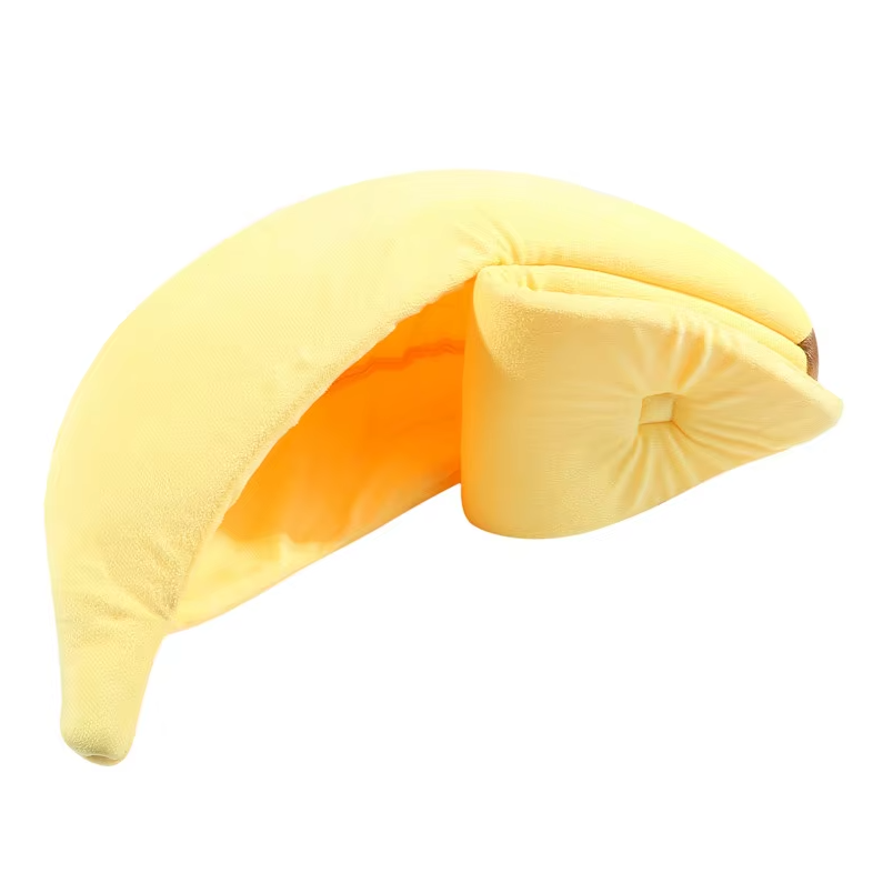 Yellow banana cat bed with the peel closed over the hollow
