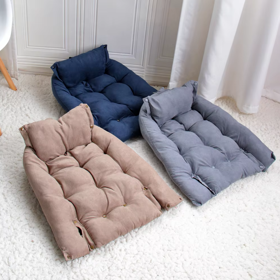 Navy and grey beds in their bed shape and a taupe one opened out flat as a mat