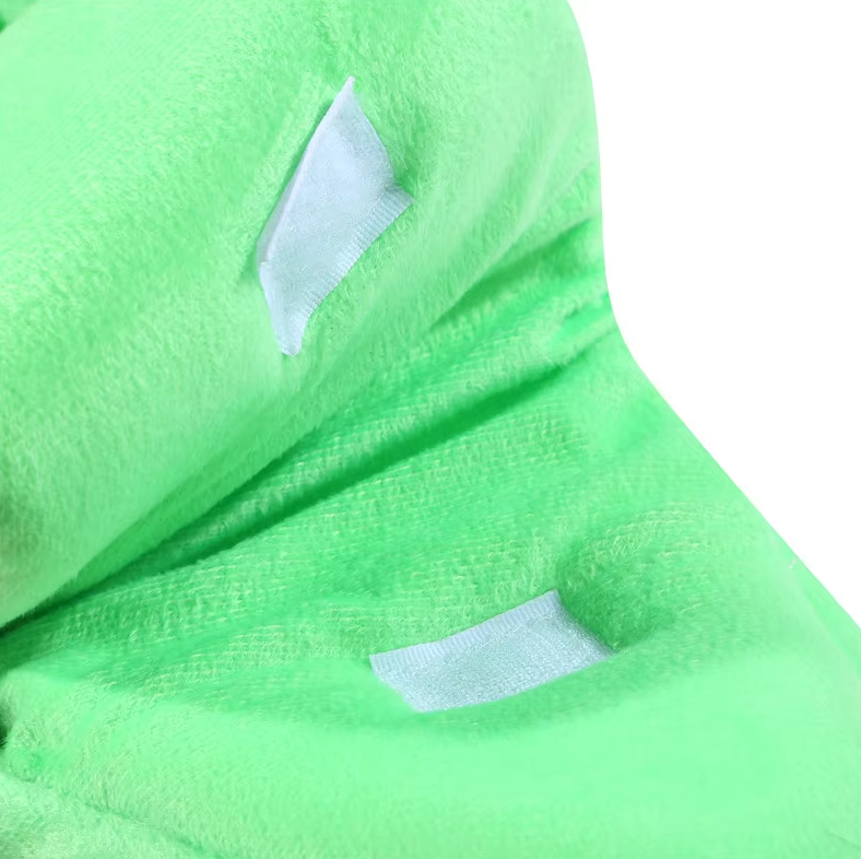 Close view of the hook-and-loop patches on the green banana cat bed