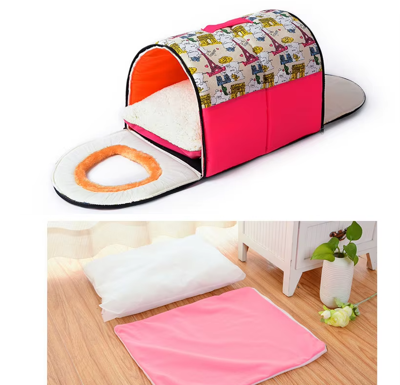 Pet house in a city print with its front unzipped and folded down over a fleecy cushion, and the cushion pad beside its pink cover