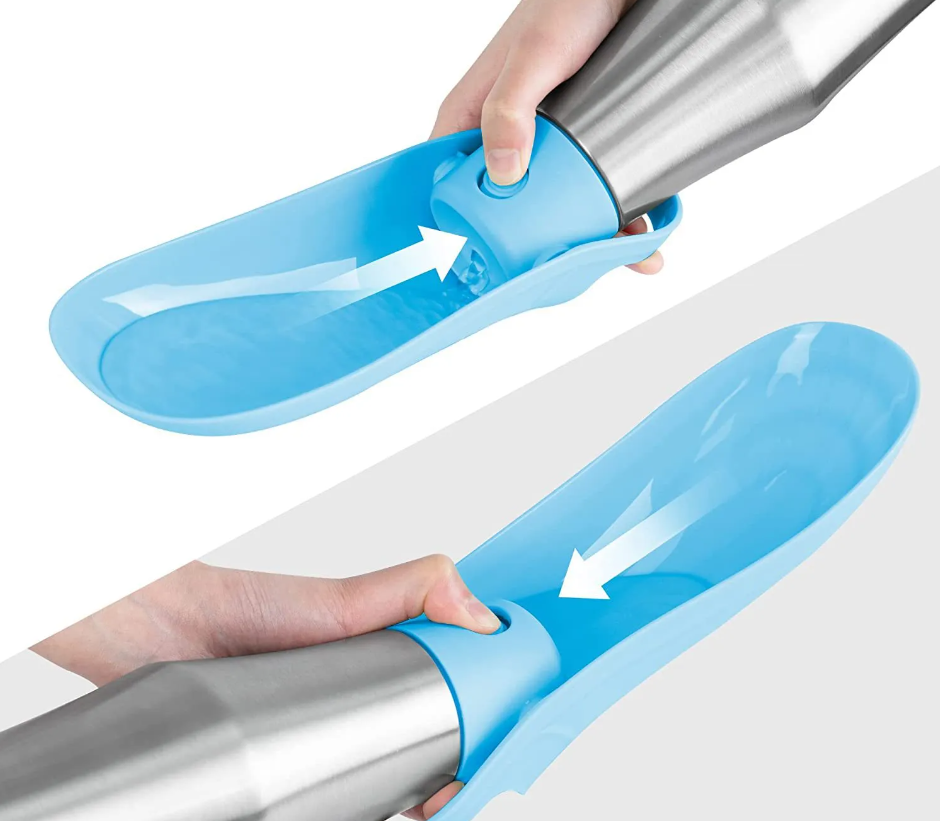 Hands swinging the light blue trough of the steel dog water bottle down and back up