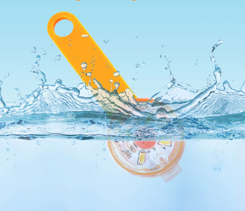 An LED collar light on its strap splashed by water