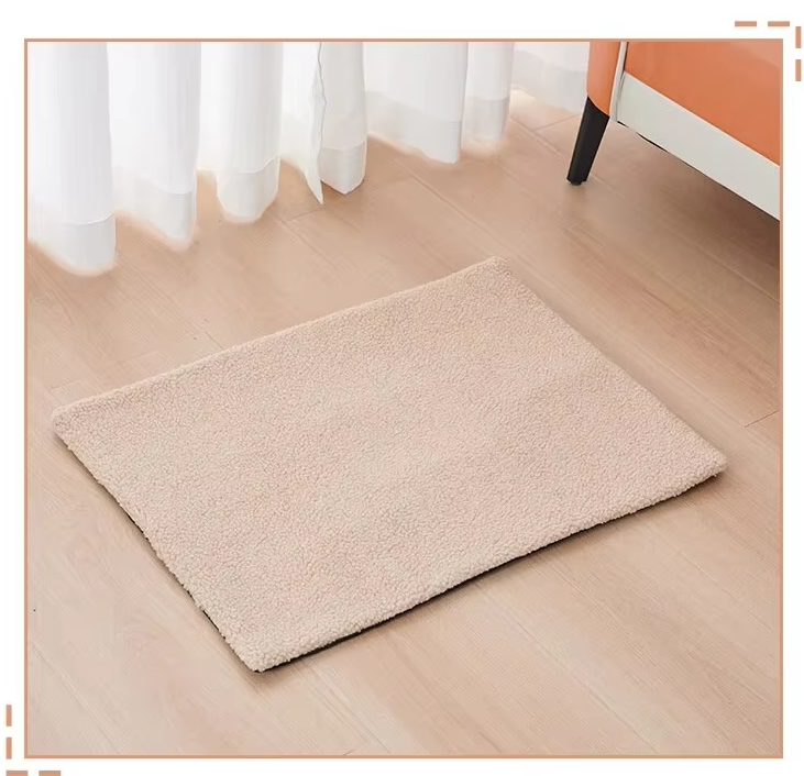 Beige curly-fleece self-warming pet mat lying on a wooden floor