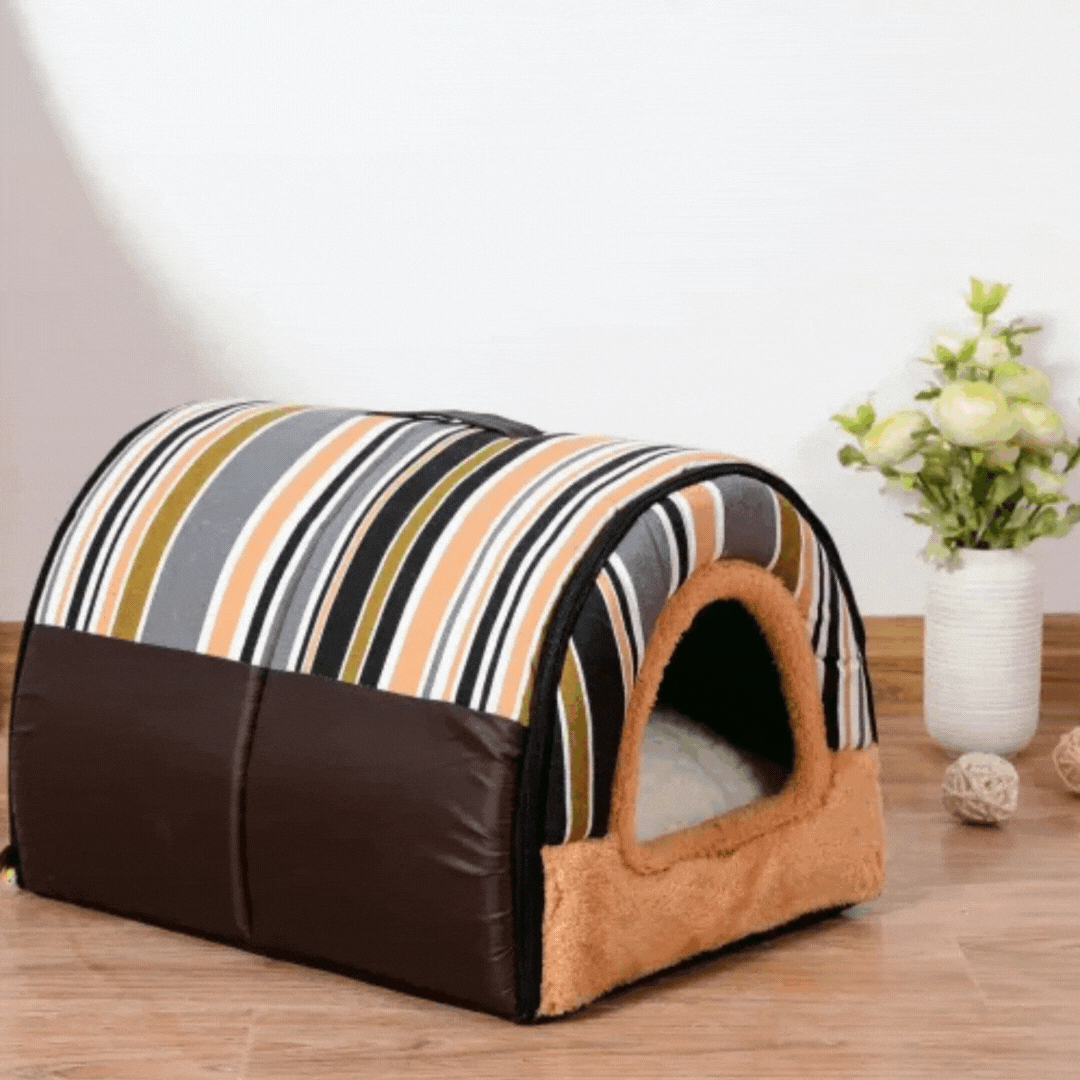 Tunnel pet house with grey, peach and olive stripes, dark brown sides and a tan plush doorway