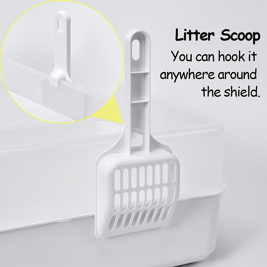 The white litter scoop hooked onto the clear shield