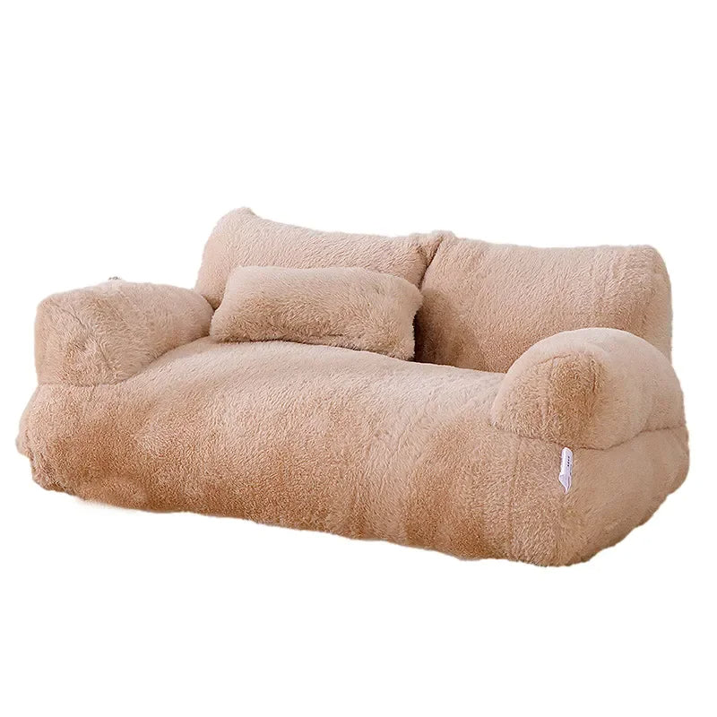 Camel plush dog sofa bed with two armrests and a small pillow