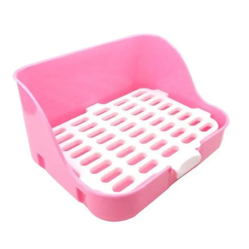 Pink small-pet litter tray with a white removable grid