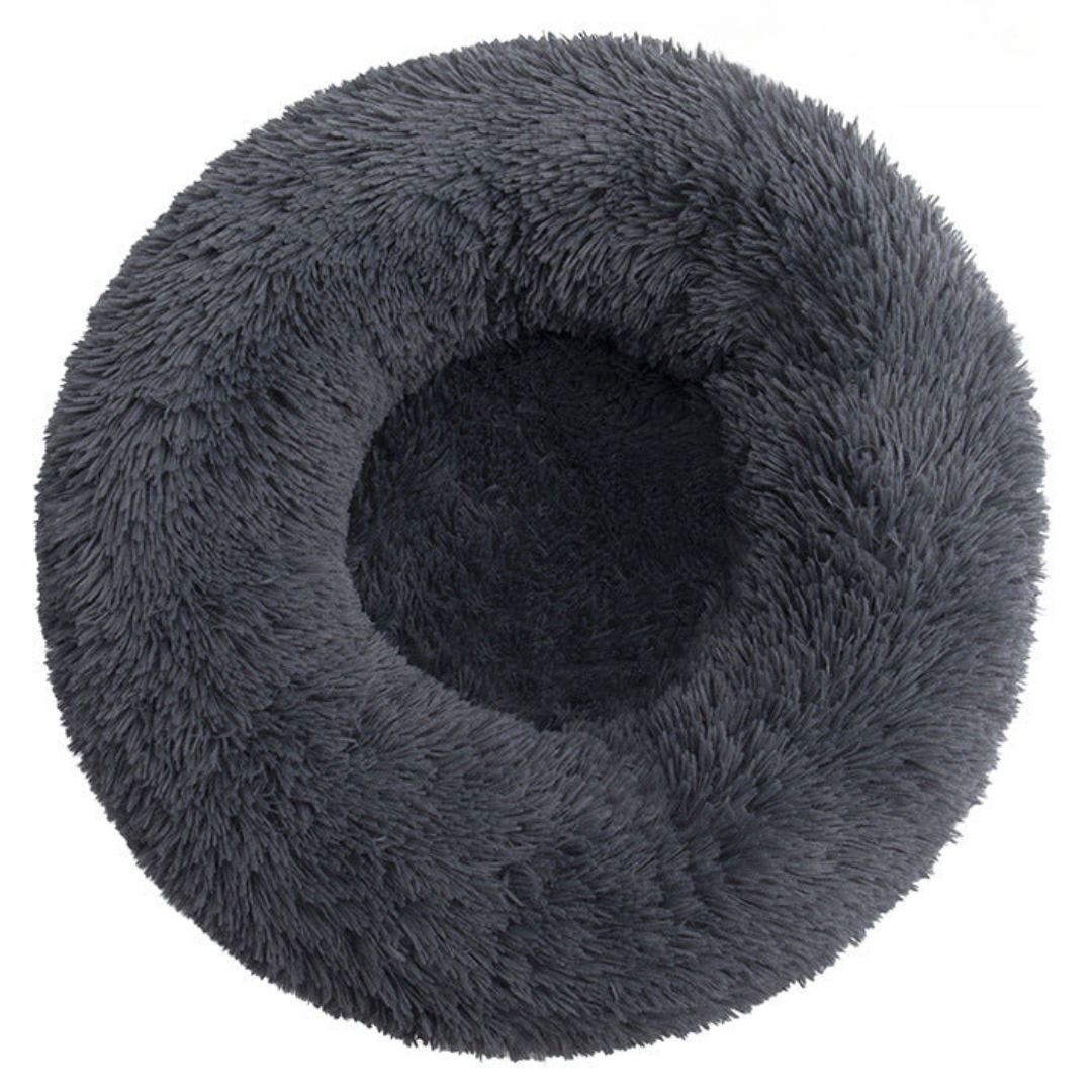 Dark grey round fluffy donut bed seen from above