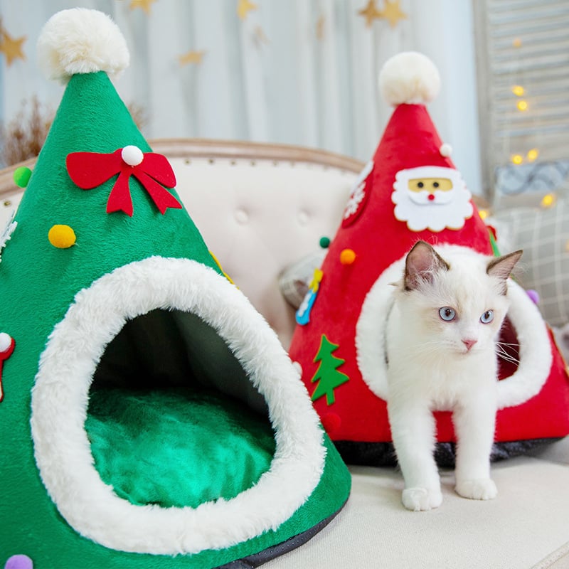 Green and red Christmas tree cave beds side by side, the green one showing its plush lining and floor