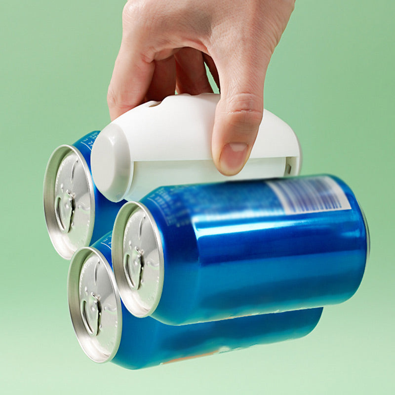 The sticky roller lifting three drinks cans to show its grip
