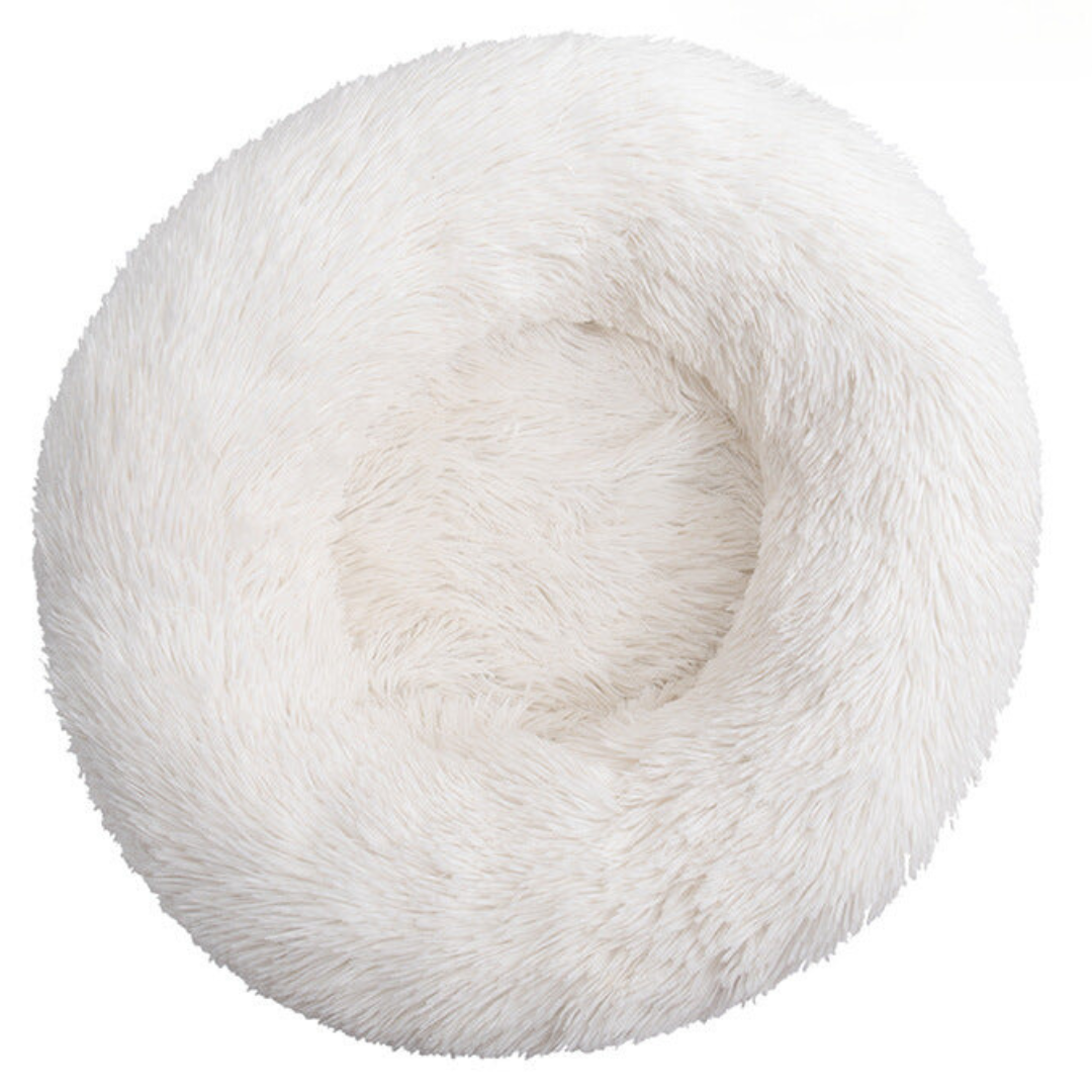 White round fluffy donut bed seen from above